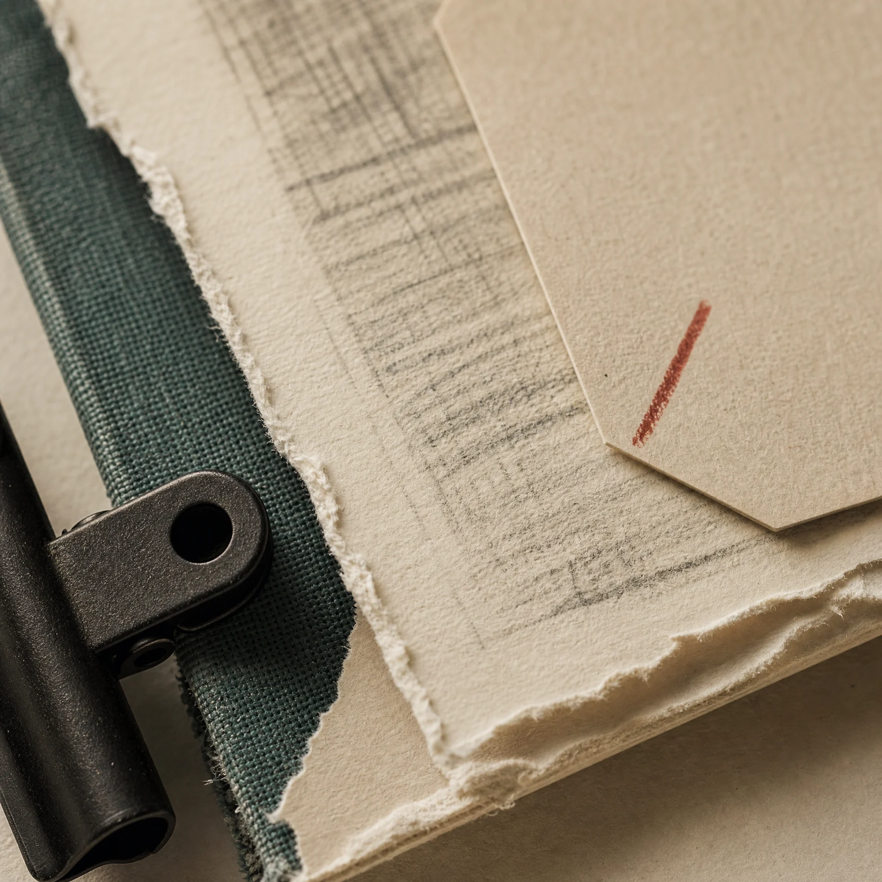 Macro study of paper proof marks, clips and textured material